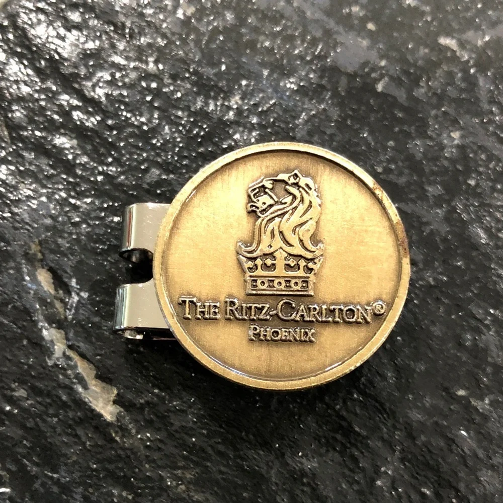 The Ritz Carlton Phoenix golf ball marker with hat clip rare over 10 yr old